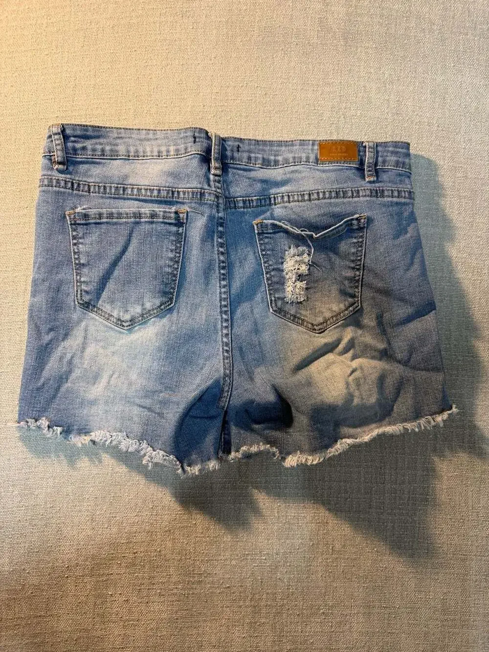 RED Denim Couture Distressed Raw Hem Denim Shorts